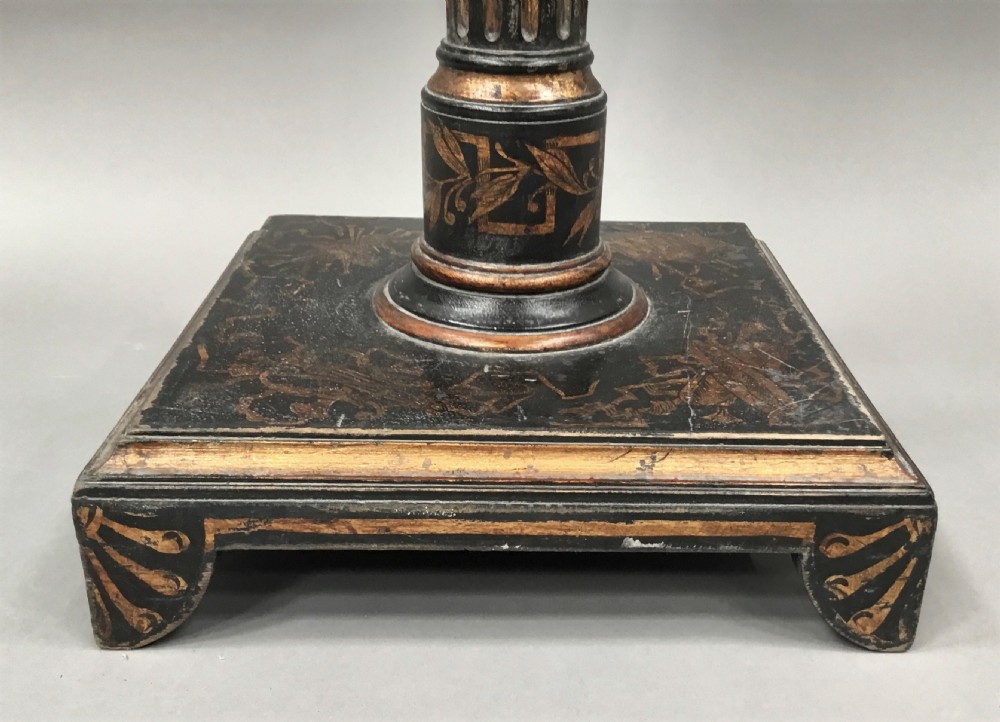 A square-topped Regency neoclassical painted pedestal occasional table with central winged figure motif and turned column on a plinth base. View XIV