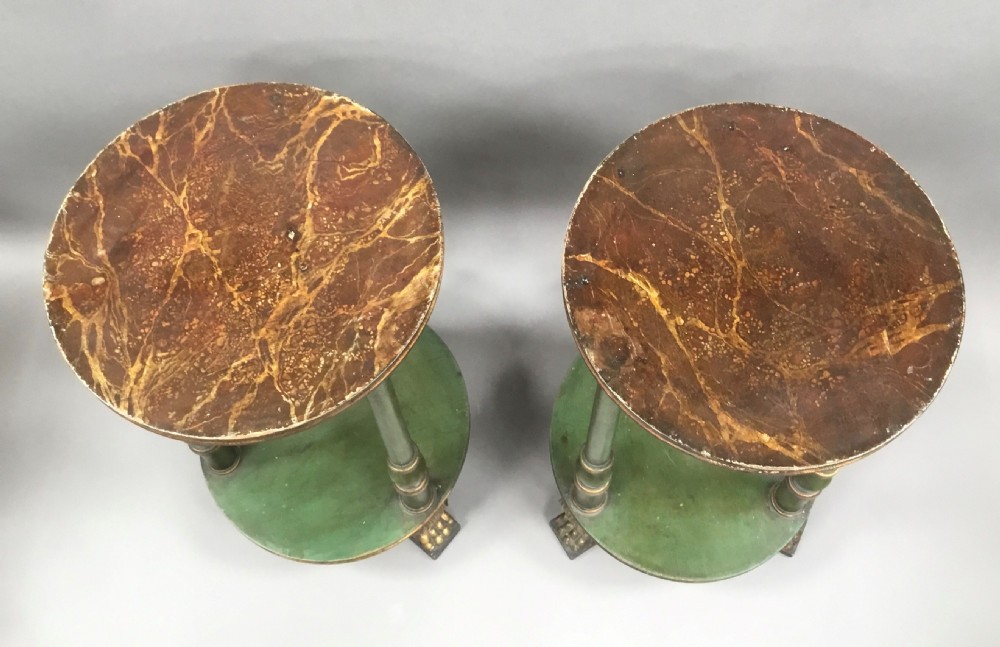 A pair of tall 19th-century Swedish neoclassical stands painted green with gilded accents, circular tops, lower shelves, and turned columns raised on carved lion paw feet. View V