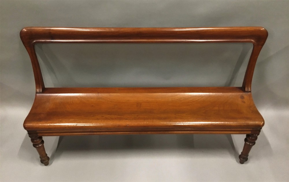 George IV mahogany hall bench / hall seat; of an unusual sculptural design View III