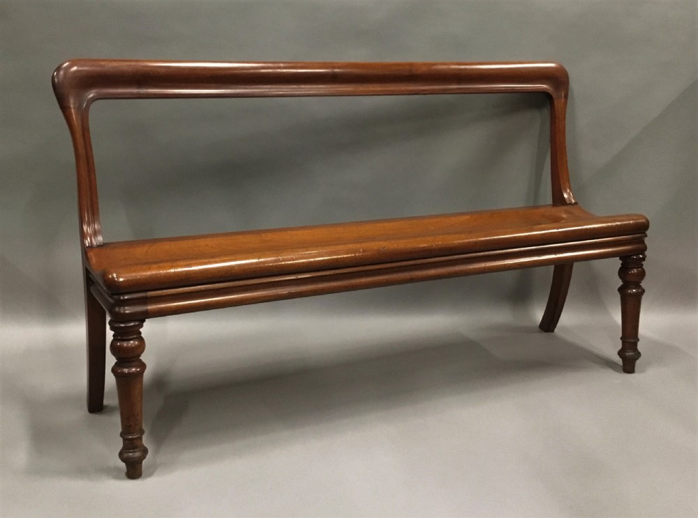 George IV mahogany hall bench / hall seat; of an unusual sculptural design View IV