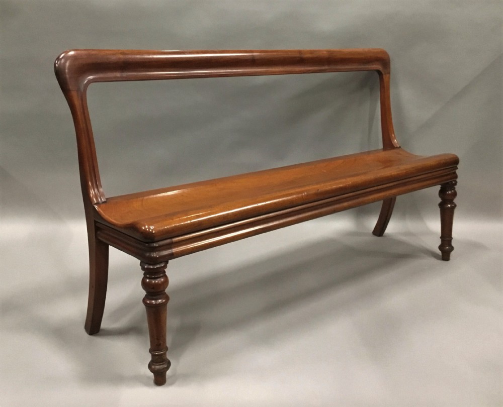 George IV mahogany hall bench / hall seat; of an unusual sculptural design View VIII
