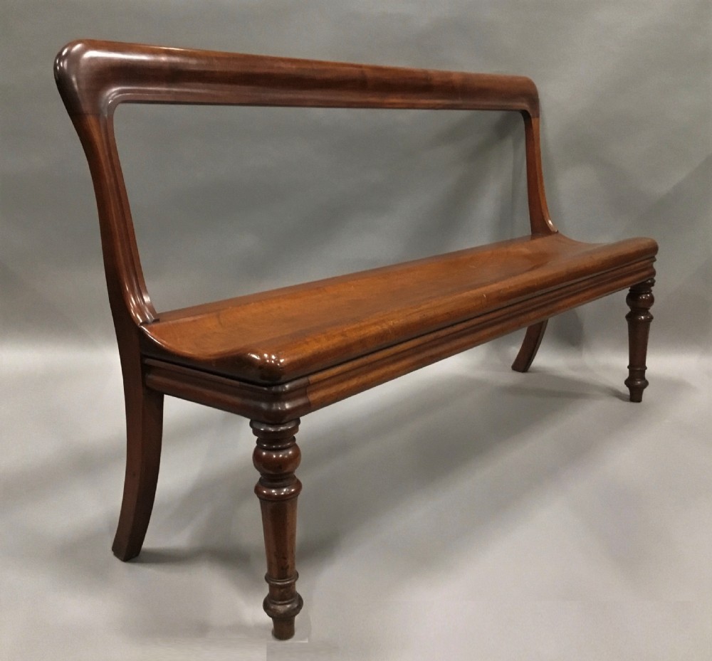 George IV mahogany hall bench / hall seat; of an unusual sculptural design View IX