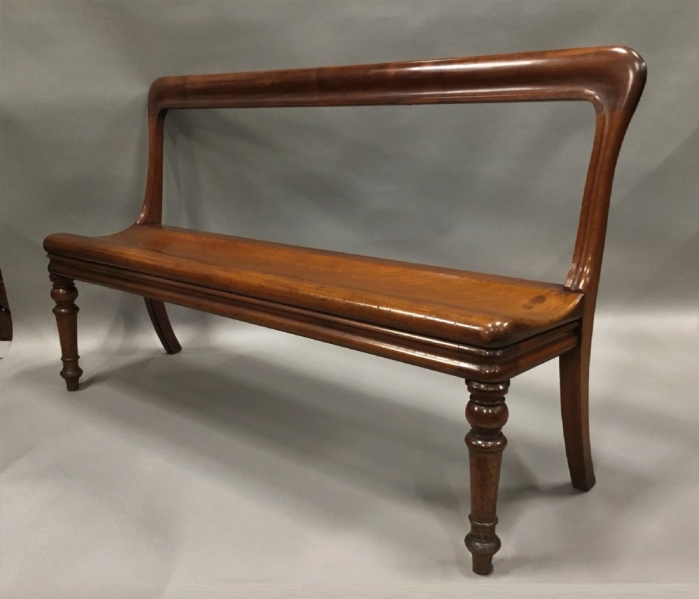 George IV mahogany hall bench / hall seat; of an unusual sculptural design View XI