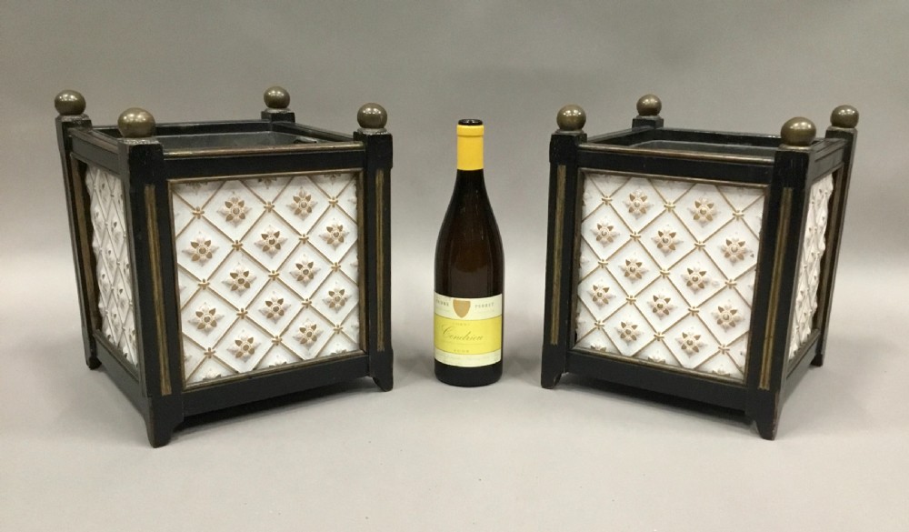A pair of 19th-century square ebonised wood jardinieres featuring cream ceramic Minton tiles with raised star motifs, brass ball finials, and internal metal liners. View II