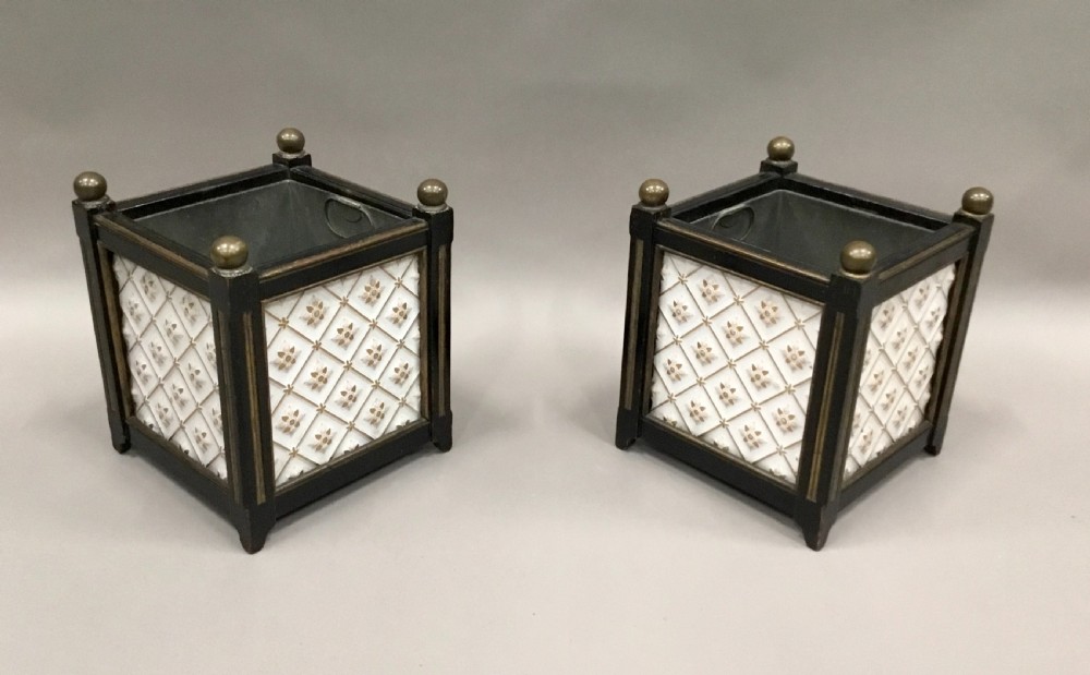 A pair of 19th-century square ebonised wood jardinieres featuring cream ceramic Minton tiles with raised star motifs, brass ball finials, and internal metal liners. View XI