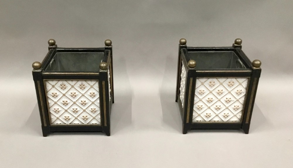 A pair of 19th-century square ebonised wood jardinieres featuring cream ceramic Minton tiles with raised star motifs, brass ball finials, and internal metal liners. View XIV