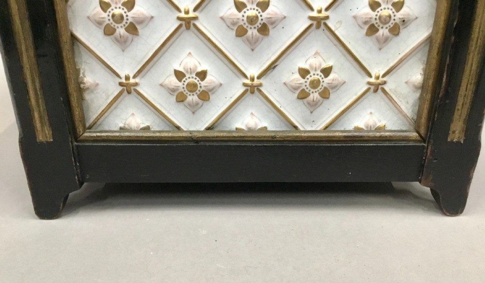 A pair of 19th-century square ebonised wood jardinieres featuring cream ceramic Minton tiles with raised star motifs, brass ball finials, and internal metal liners. View XVII