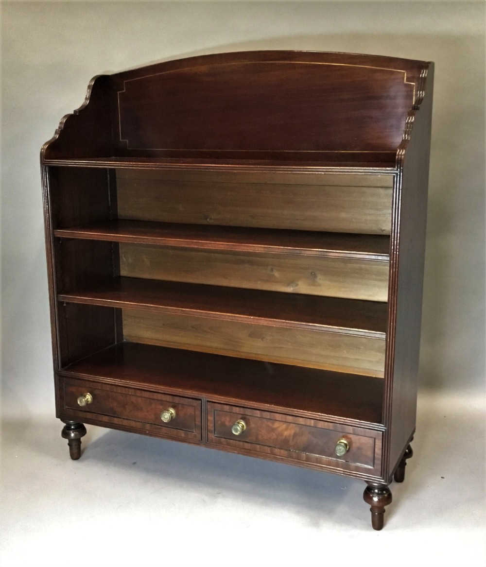  Regency figured mahogany open bookcase; attributed to Gillows of excellent quality