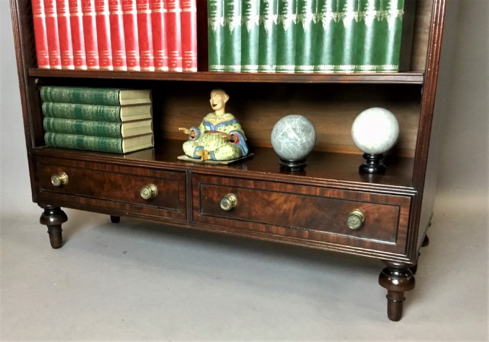  Regency figured mahogany open bookcase; attributed to Gillows of excellent quality View IV