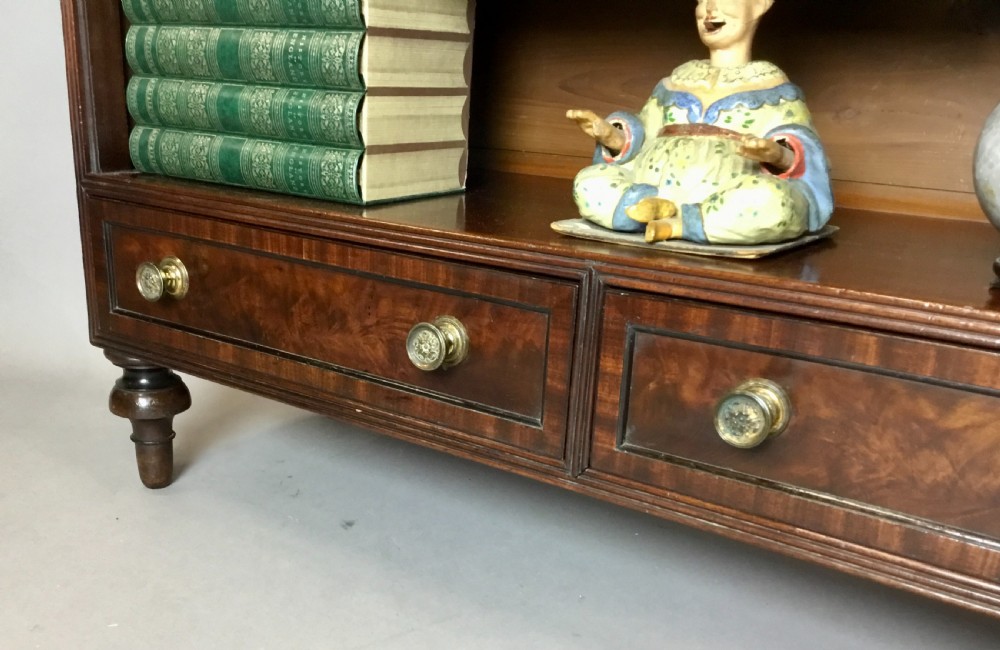  Regency figured mahogany open bookcase; attributed to Gillows of excellent quality View X