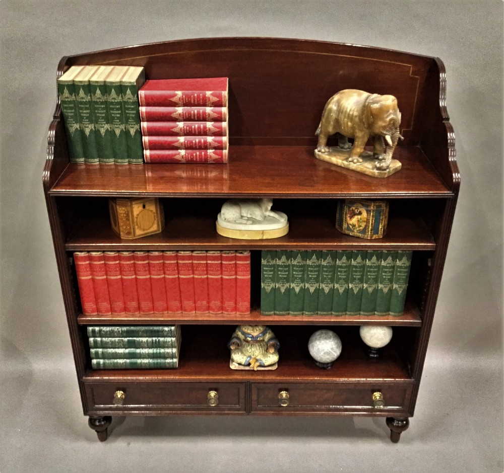  Regency figured mahogany open bookcase; attributed to Gillows of excellent quality View XVI