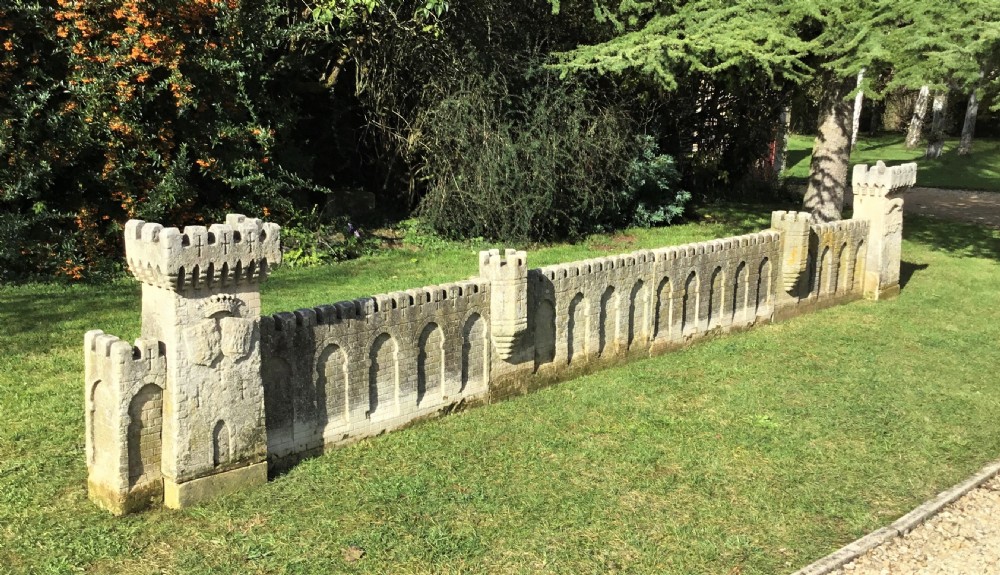 Magnificent late C18th carved stone 19ft scale replica of a castle / chateau wall