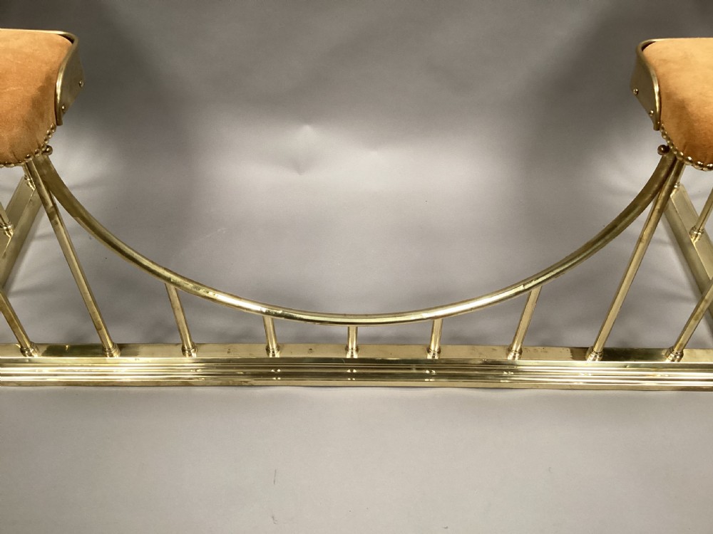 C19th brass club fender newly upholstered View V