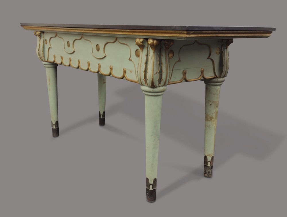 A 19th-century Italian painted side table with a dark top, sage green frame, turned tapering legs, and gilded scalloped apron details. View II