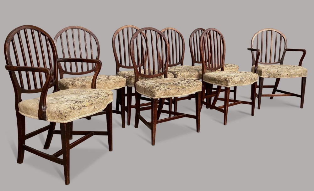 George III set of 8 mahogany dining chairs; with unusual backs in the Hepplewhite manner View VI