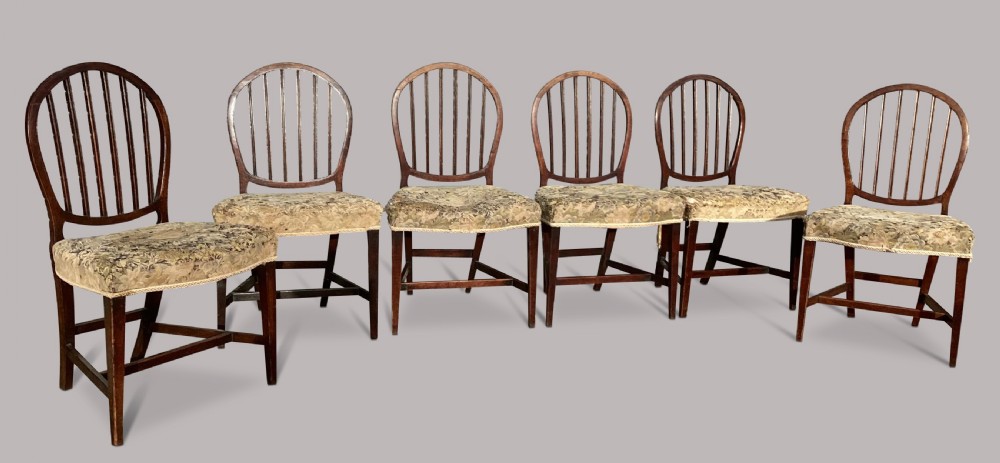 George III set of 8 mahogany dining chairs; with unusual backs in the Hepplewhite manner View VII
