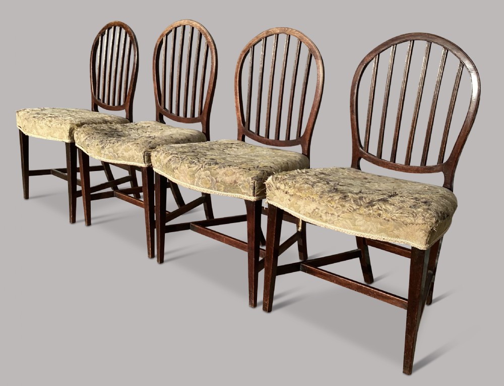George III set of 8 mahogany dining chairs; with unusual backs in the Hepplewhite manner View XI