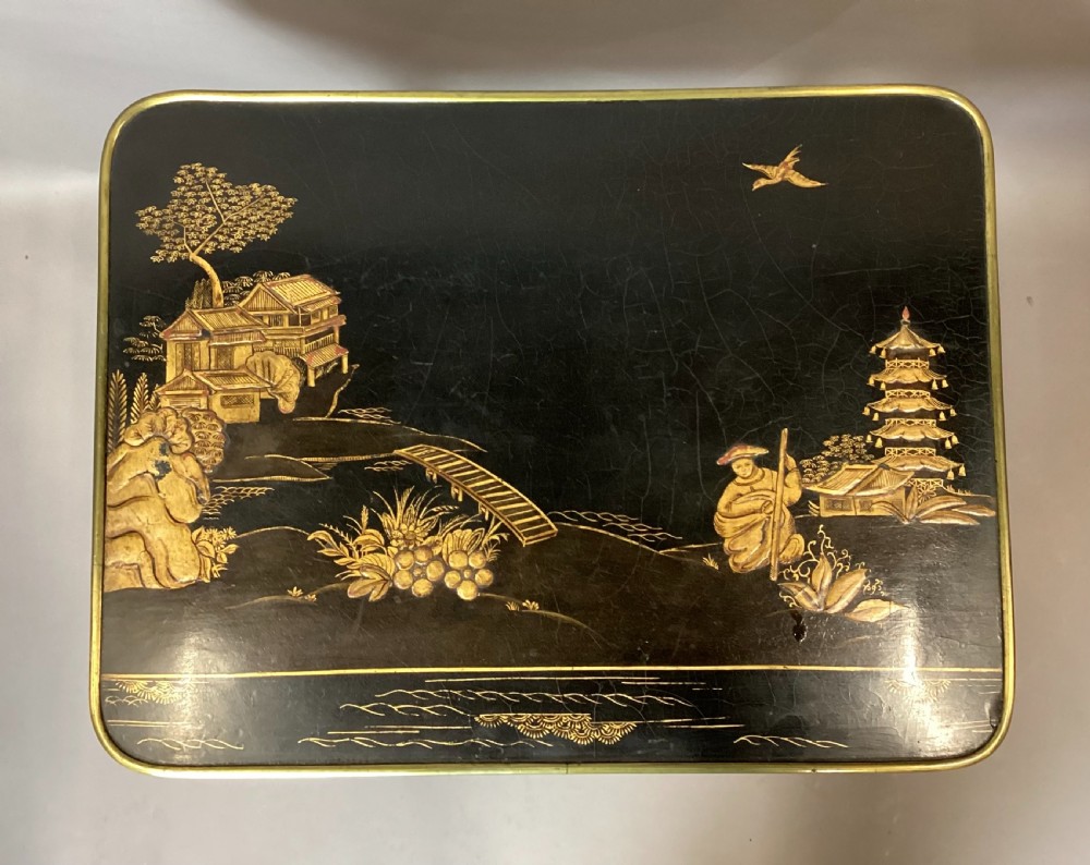 A Regency two-tier occasional table featuring black lacquer with gilt hand-painted Chinoiserie scenes and a red lower shelf. View VIII