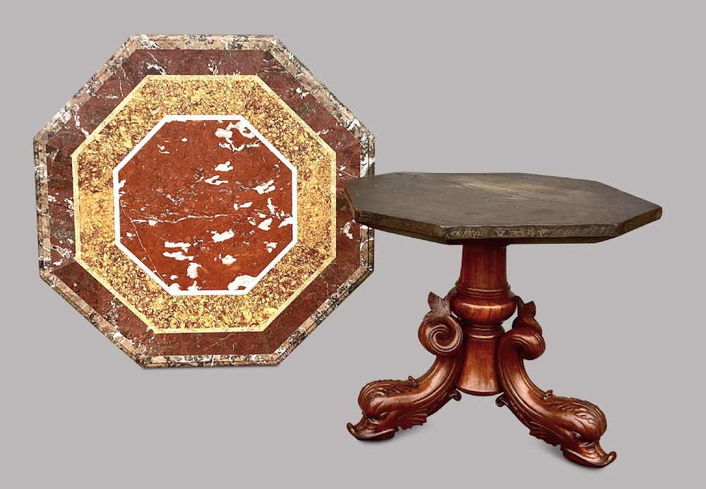 An octagonal 19th-century centre table with a geometric inlaid specimen marble top supported on a carved walnut pedestal base with scroll feet. View VII