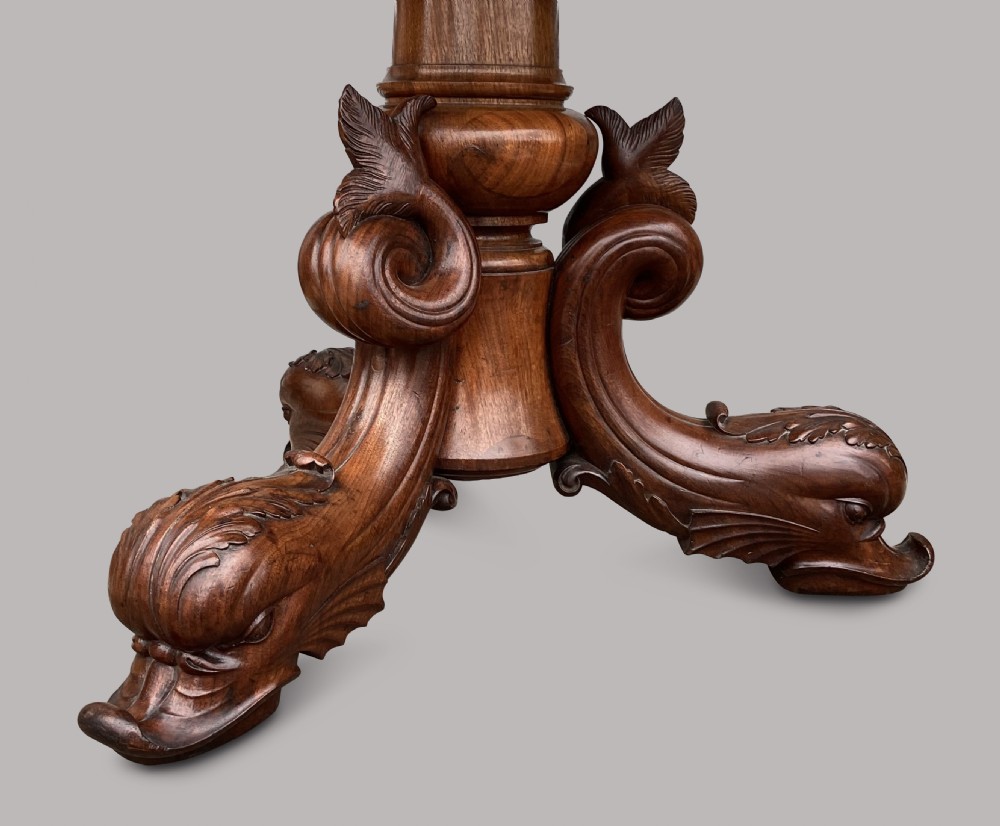 An octagonal 19th-century centre table with a geometric inlaid specimen marble top supported on a carved walnut pedestal base with scroll feet. View XIII