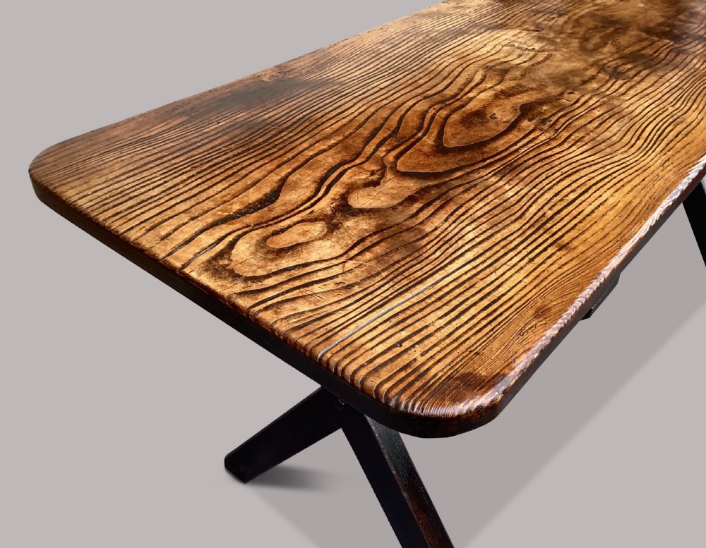 A Georgian elm tavern table featuring a long rectangular polished timber top over a dark X-frame base. View VI