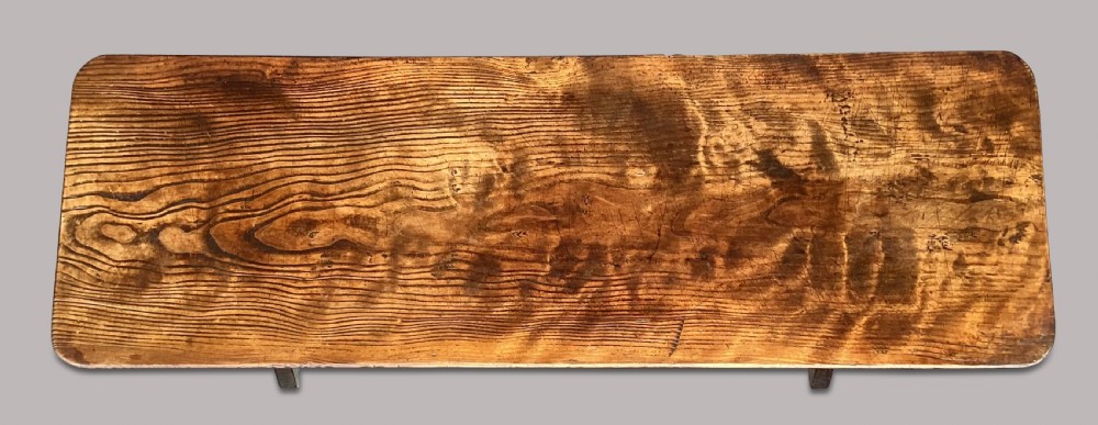 A Georgian elm tavern table featuring a long rectangular polished timber top over a dark X-frame base. View IX