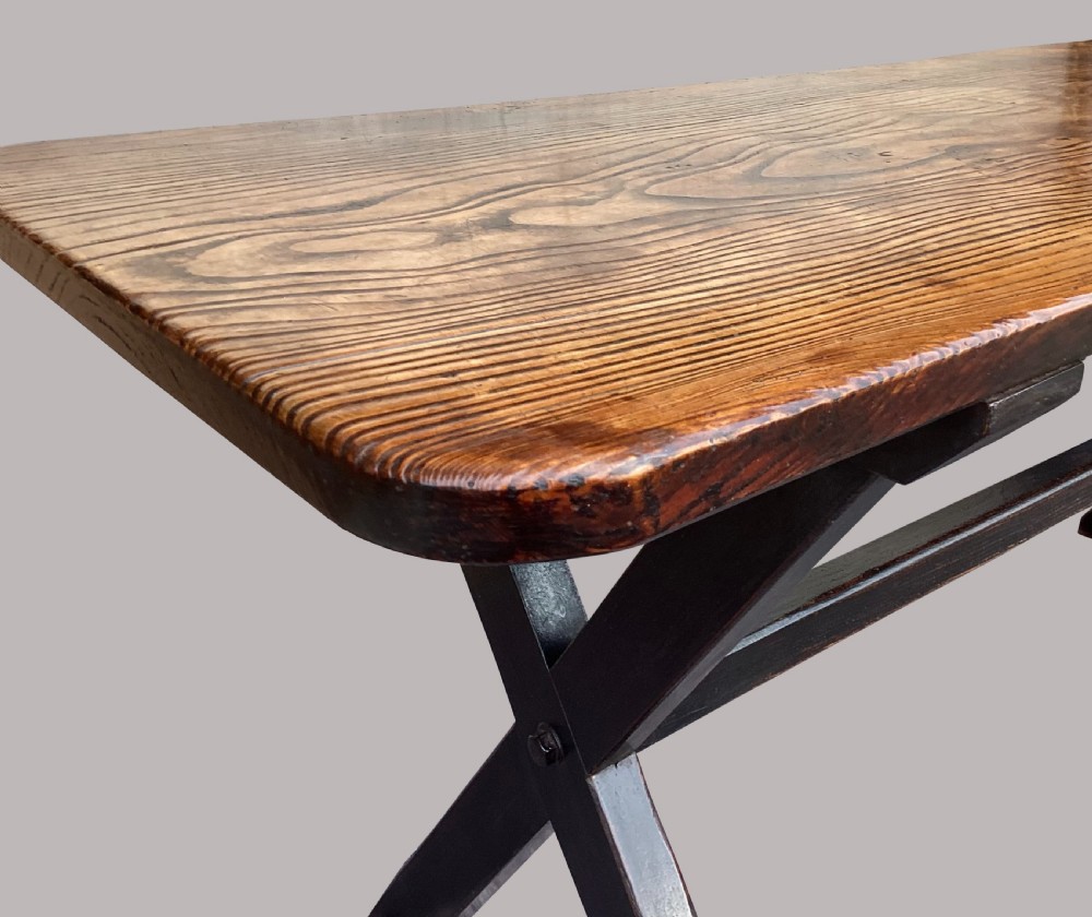 A Georgian elm tavern table featuring a long rectangular polished timber top over a dark X-frame base. View XI