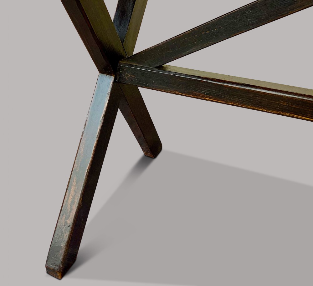 A Georgian elm tavern table featuring a long rectangular polished timber top over a dark X-frame base. View XIV