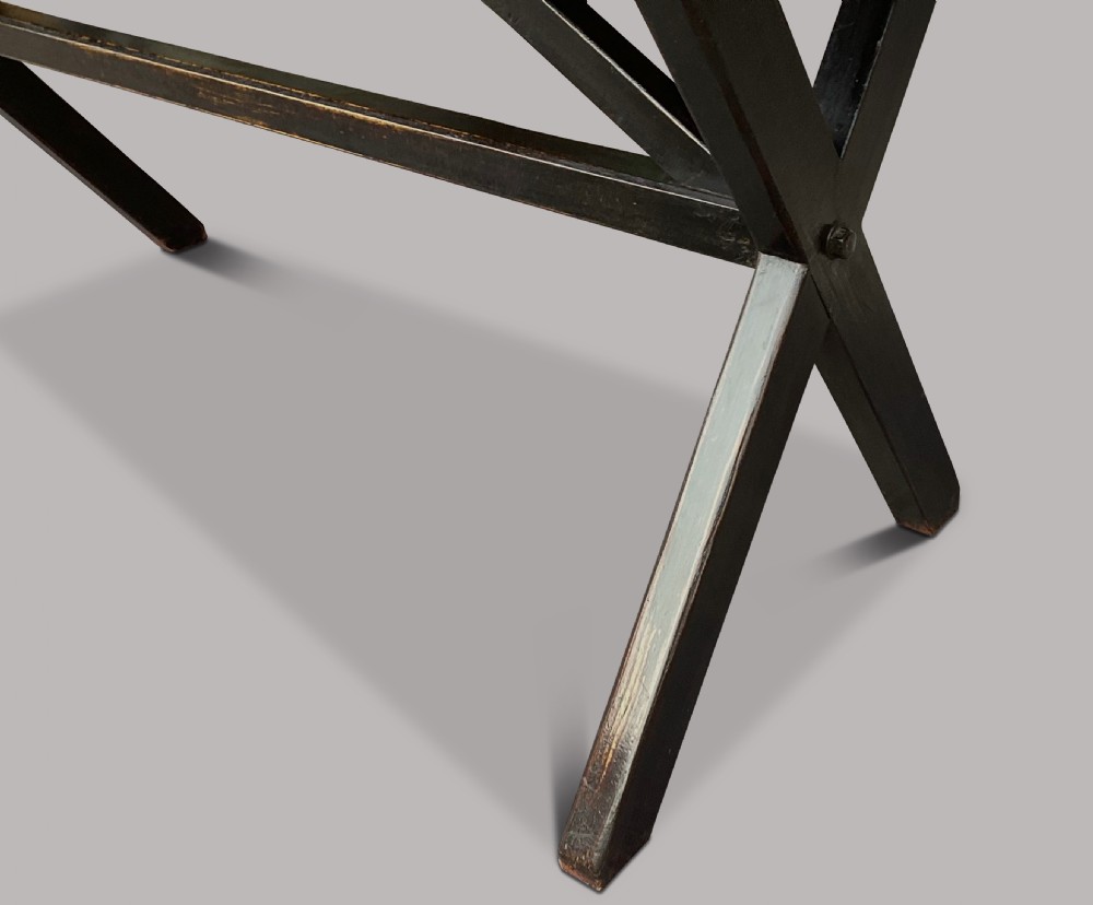 A Georgian elm tavern table featuring a long rectangular polished timber top over a dark X-frame base. View XVI
