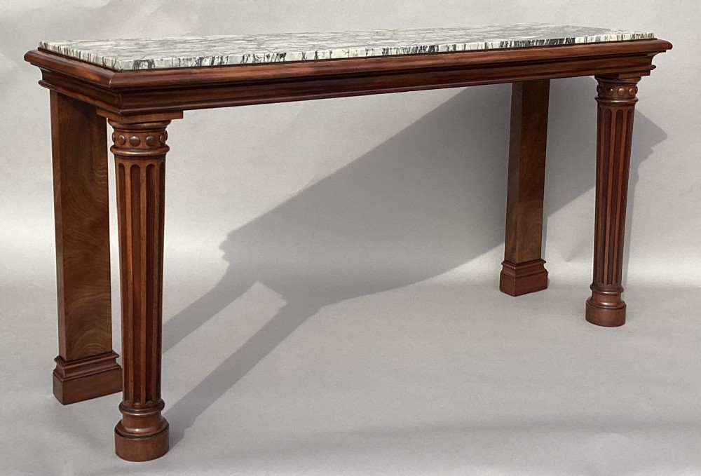George IV mahogany marble top console side table; of unusual neo-classical form