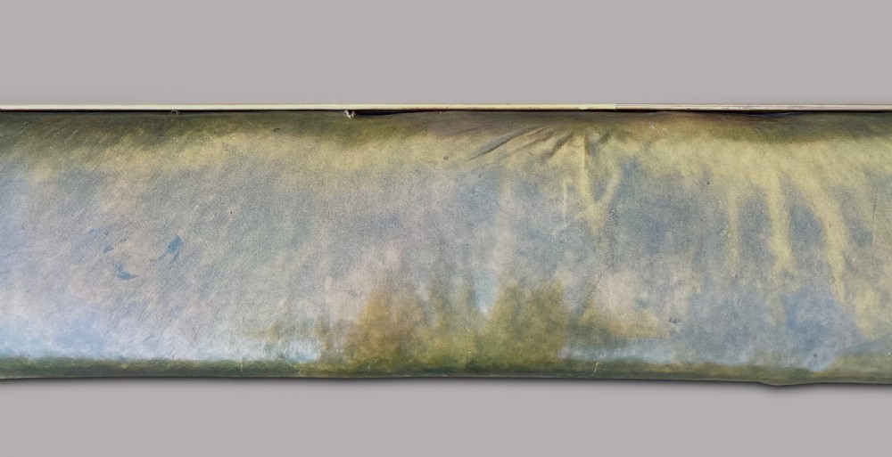 A nineteenth-century brass club fender featuring turned baluster uprights and a continuous U-shaped green leather upholstered seat cushion. View XVIII