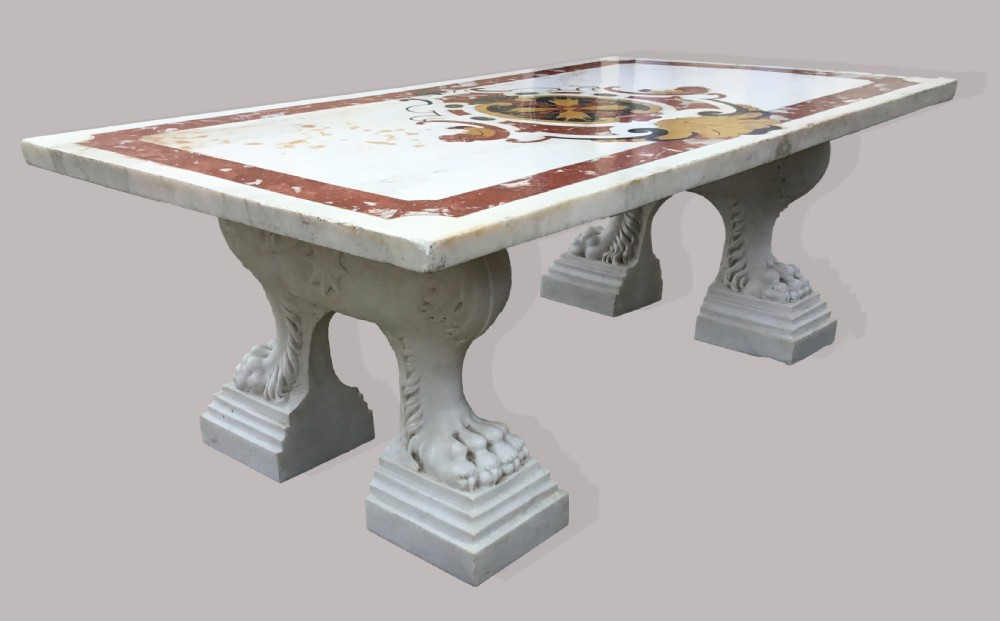An 18th-century Italian rectangular marble coffee table featuring pietre dure specimen stone inlay and carved lion-paw pedestal supports. View III