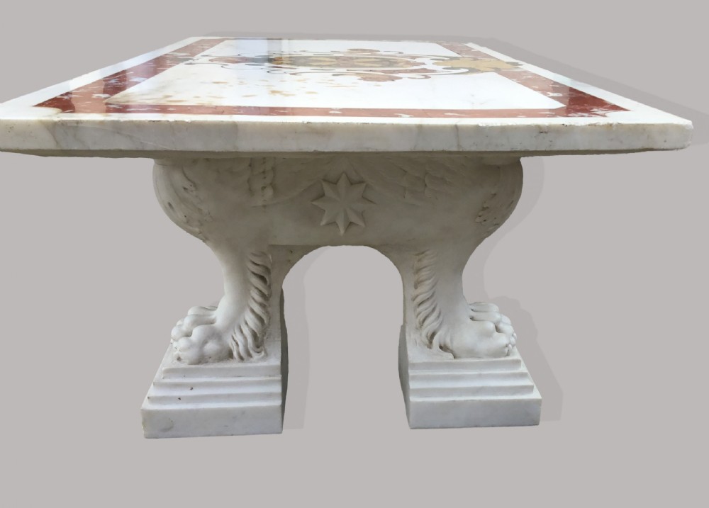 An 18th-century Italian rectangular marble coffee table featuring pietre dure specimen stone inlay and carved lion-paw pedestal supports. View IV