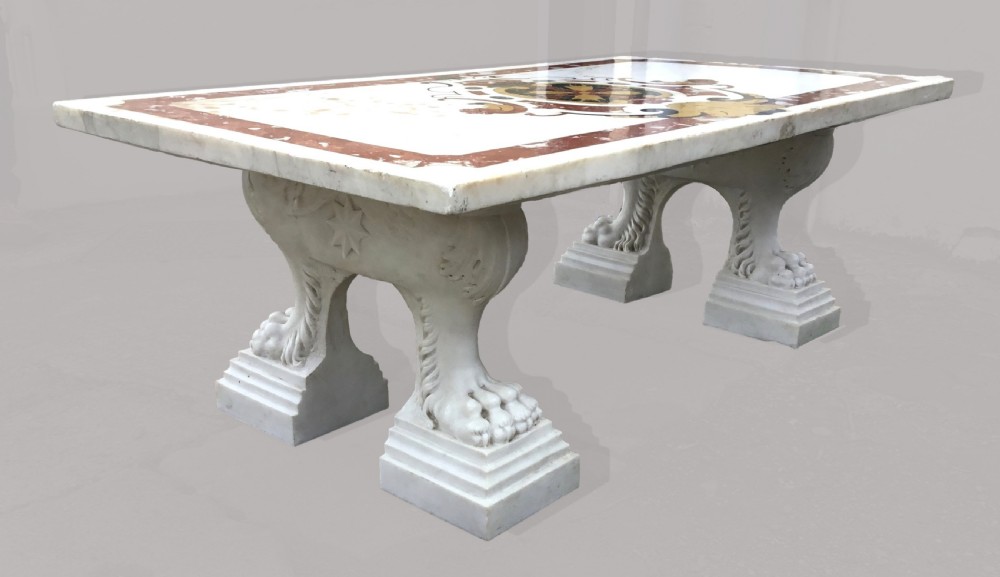 An 18th-century Italian rectangular marble coffee table featuring pietre dure specimen stone inlay and carved lion-paw pedestal supports. View VII
