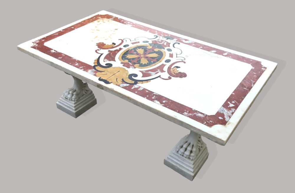 An 18th-century Italian rectangular marble coffee table featuring pietre dure specimen stone inlay and carved lion-paw pedestal supports. View XI