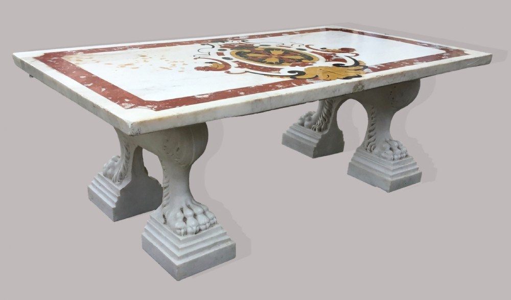 An 18th-century Italian rectangular marble coffee table featuring pietre dure specimen stone inlay and carved lion-paw pedestal supports. View XIII