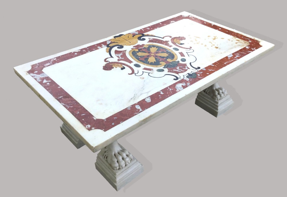 An 18th-century Italian rectangular marble coffee table featuring pietre dure specimen stone inlay and carved lion-paw pedestal supports. View XV