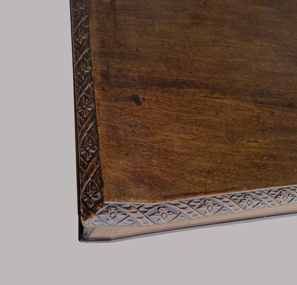 A George III mahogany side table featuring a rectangular carved-edge top, plain frieze, and straight legs. View XII