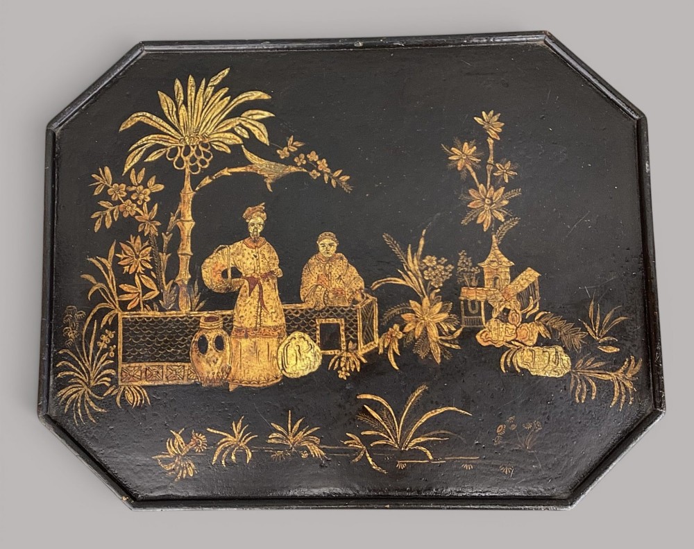 A Regency black lacquered octagonal top wine table with gilded Chinoiserie figure decoration on a turned tripod base. View XIII