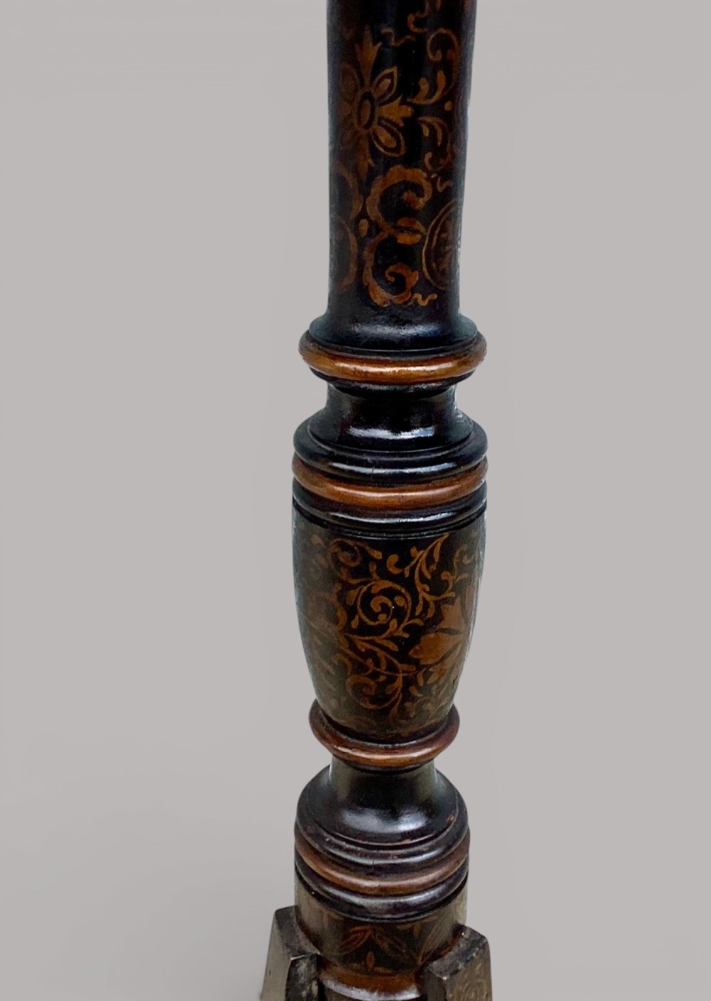 A Regency black lacquered octagonal top wine table with gilded Chinoiserie figure decoration on a turned tripod base. View XIV