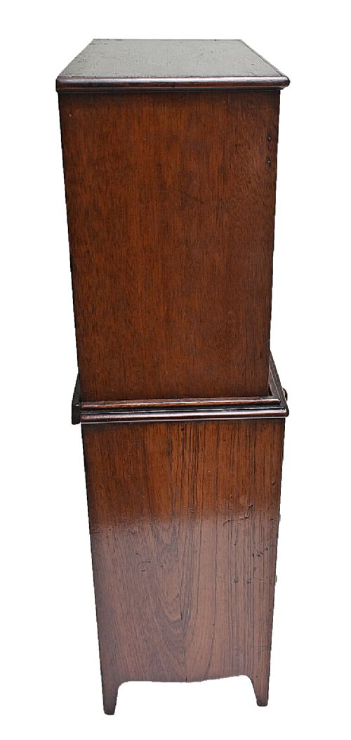 A dark mahogany Georgian apprentice chest of four drawers with a removable two-door glazed cabinet upper section. View IV