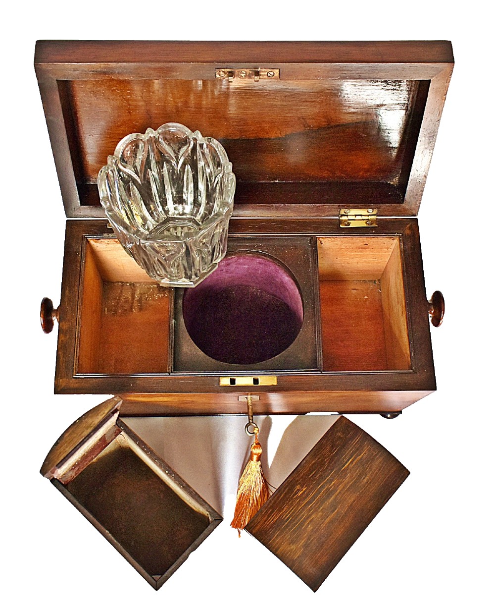 An open William IV sarcophagus-shaped dark wood tea caddy containing two lidded canisters and a central glass mixing bowl. View XI