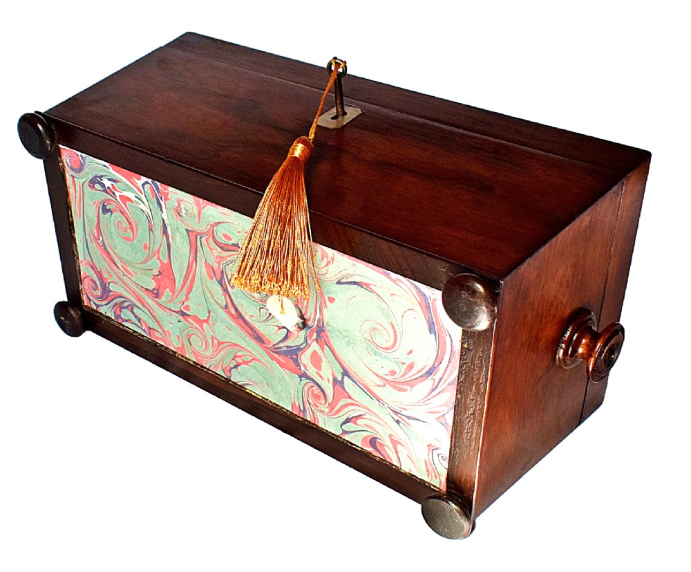 An open William IV sarcophagus-shaped dark wood tea caddy containing two lidded canisters and a central glass mixing bowl. View XIV