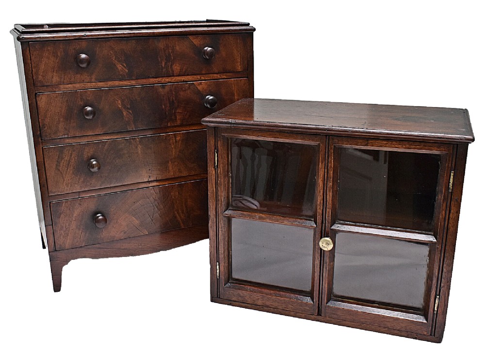 A dark mahogany Georgian apprentice chest of four drawers with a removable two-door glazed cabinet upper section. View X
