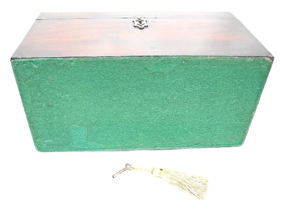 An open rectangular dark wood tea caddy featuring two internal covered compartments, a central cut glass mixing bowl, a green fabric-lined lid, and a key with a tassel inserted in the front lock. View XII