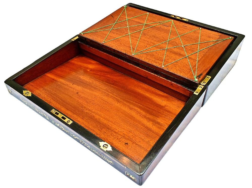 A dark rosewood writing slope with intricate mother-of-pearl floral inlays along the borders and a brass key with tassel attached to the front lock. View VIII