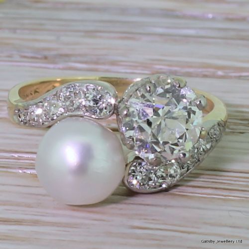 fig 1.
Art Deco Natural Pearl & 1.36 Carat Old Cut Diamond Crossover Ring, circa 1920