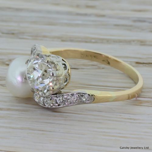 fig 2.
Art Deco Natural Pearl & 1.36 Carat Old Cut Diamond Crossover Ring, circa 1920