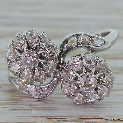 fig 1. Mid-Century 1.50 Carat Old Mine Cut Double Daisy Twist Ring, circa 1940