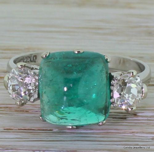 fig 1. Art Deco 4.02 Carat Cabochon Emerald & 1.01 Carat Diamond Ring, circa 1930